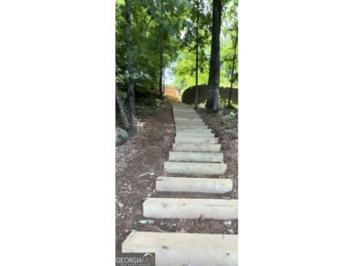 Acreage on the lake! Including 7 3/4 (+/-) acres, over 1100 feet on Chattahoochee Golf Course in Georgia - for sale on GolfHomes.com, golf home, golf lot