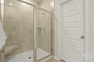 This beautifully maintained 3-bedroom, 2-bathroom residence on Savannah Quarters Country Club in Georgia - for sale on GolfHomes.com, golf home, golf lot