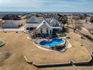 Situated on 2.13 acres inside the gated community of Canyon West on Canyon West Golf Club in Texas - for sale on GolfHomes.com, golf home, golf lot