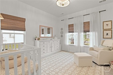 This beautifully maintained 3-bedroom, 2-bathroom residence on Savannah Quarters Country Club in Georgia - for sale on GolfHomes.com, golf home, golf lot