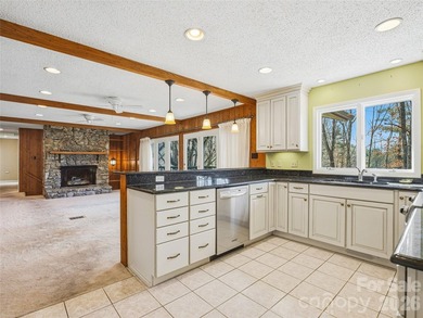 Tucked along the fairways of the Country Club of Asheville, this on  in North Carolina - for sale on GolfHomes.com, golf home, golf lot