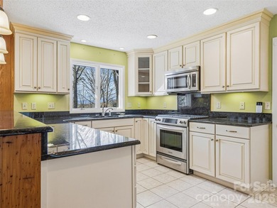 Tucked along the fairways of the Country Club of Asheville, this on  in North Carolina - for sale on GolfHomes.com, golf home, golf lot