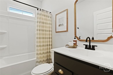 This beautifully maintained 3-bedroom, 2-bathroom residence on Savannah Quarters Country Club in Georgia - for sale on GolfHomes.com, golf home, golf lot