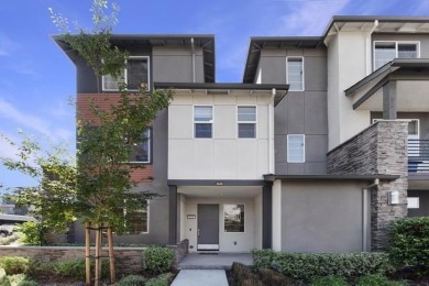 This contemporary three-story townhouse, oriented towards the on Mission Hills of Hayward Golf Course in California - for sale on GolfHomes.com, golf home, golf lot