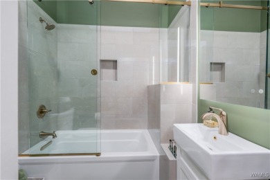 Nestled on a private 2.41-acre lot with an additional 1.51-acre on NorthRiver Yacht Club in Alabama - for sale on GolfHomes.com, golf home, golf lot