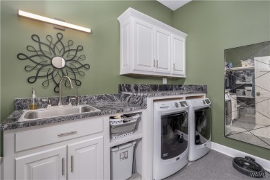 Nestled on a private 2.41-acre lot with an additional 1.51-acre on NorthRiver Yacht Club in Alabama - for sale on GolfHomes.com, golf home, golf lot