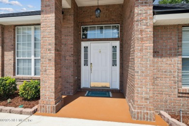 **Move in ready!** This beautifully landscaped all-brick on Magnolia Point Golf and Country Club in Florida - for sale on GolfHomes.com, golf home, golf lot