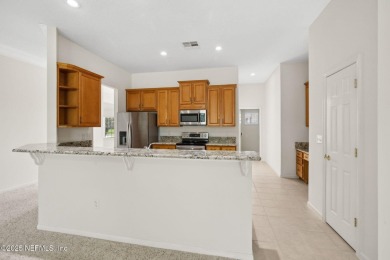 **Move in ready!** This beautifully landscaped all-brick on Magnolia Point Golf and Country Club in Florida - for sale on GolfHomes.com, golf home, golf lot