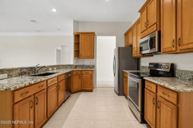 **Move in ready!** This beautifully landscaped all-brick on Magnolia Point Golf and Country Club in Florida - for sale on GolfHomes.com, golf home, golf lot