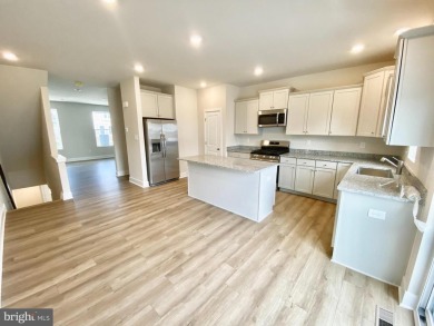 MOVE IN READY!  BAYLOR WITH DECK & 3RD BATHROOM!  Move in ready on Plantation Lakes Golf and Country Club in Delaware - for sale on GolfHomes.com, golf home, golf lot