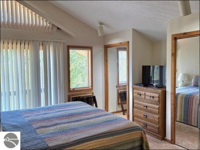 This turn key 2-bedroom, 2-bathroom condo offers beautiful golf on  in Michigan - for sale on GolfHomes.com, golf home, golf lot