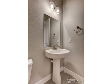 The Duxbury by Landmark Homes offers ranch style living + on Highland Meadows Golf Course in Colorado - for sale on GolfHomes.com, golf home, golf lot
