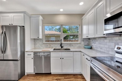 Your search is officially over! This meticulously renovated home on Clearwater Country Club in Florida - for sale on GolfHomes.com, golf home, golf lot