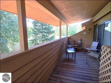 This turn key 2-bedroom, 2-bathroom condo offers beautiful golf on  in Michigan - for sale on GolfHomes.com, golf home, golf lot