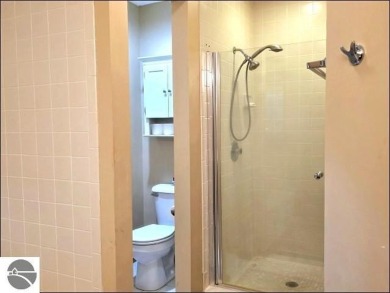 This turn key 2-bedroom, 2-bathroom condo offers beautiful golf on  in Michigan - for sale on GolfHomes.com, golf home, golf lot
