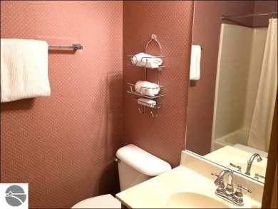 This turn key 2-bedroom, 2-bathroom condo offers beautiful golf on  in Michigan - for sale on GolfHomes.com, golf home, golf lot