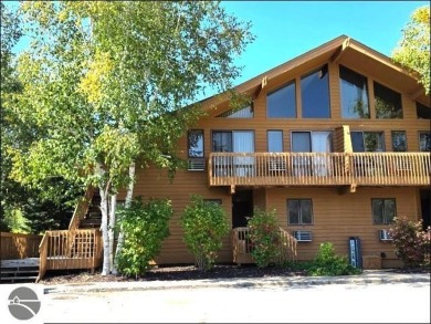 This turn key 2-bedroom, 2-bathroom condo offers beautiful golf on  in Michigan - for sale on GolfHomes.com, golf home, golf lot