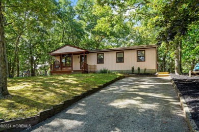 There is so much to love about this well cared for ranch in a on Ocean County Golf Course At Atlantis in New Jersey - for sale on GolfHomes.com, golf home, golf lot