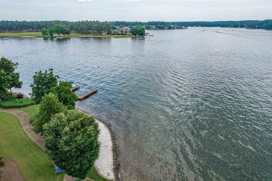 Enjoy the main lake views from spectacular corner condo in on The Golf Club at Cuscowilla in Georgia - for sale on GolfHomes.com, golf home, golf lot