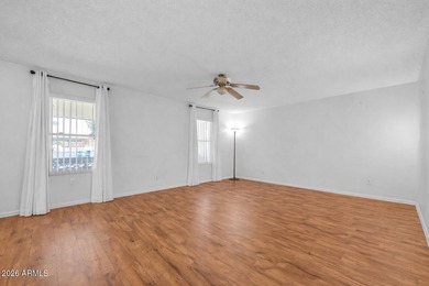 This home is priced to sell! Freshly-painted, move-in ready home on Sun City Riverview Golf Course in Arizona - for sale on GolfHomes.com, golf home, golf lot