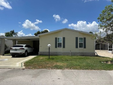 ENJOY PEACEFUL WATERFRONT LIVING IN THIS BRIGHT AND SPACIOUS on Schalamar Creek Golf and Country Club in Florida - for sale on GolfHomes.com, golf home, golf lot