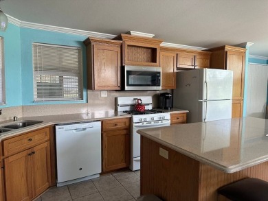 ENJOY PEACEFUL WATERFRONT LIVING IN THIS BRIGHT AND SPACIOUS on Schalamar Creek Golf and Country Club in Florida - for sale on GolfHomes.com, golf home, golf lot