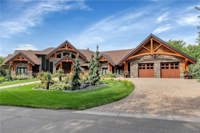 Enjoy the epitome of luxury living on the 16th hole at the St on St. Cloud Country Club in Minnesota - for sale on GolfHomes.com, golf home, golf lot