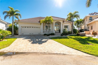 Stunning WATERFRONT home on a KEY LOT in desirable deed on Twin Isles Country Club in Florida - for sale on GolfHomes.com, golf home, golf lot