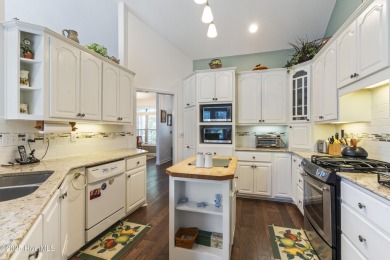 This well built, elegant home offers a unique blend of luxury on Sea Trail Golf Resort in North Carolina - for sale on GolfHomes.com, golf home, golf lot