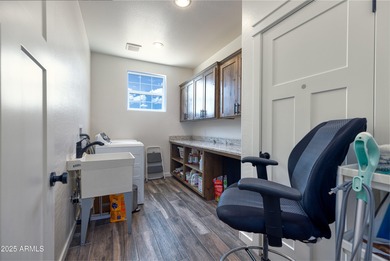 Welcome to this beautifully cared-for 4-bedroom, 2-bathroom home on Snowflake Municipal Golf Course in Arizona - for sale on GolfHomes.com, golf home, golf lot