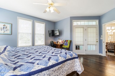 This well built, elegant home offers a unique blend of luxury on Sea Trail Golf Resort in North Carolina - for sale on GolfHomes.com, golf home, golf lot