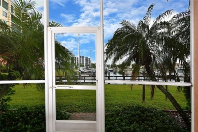 Ground floor marina-front condo puts you a few steps away from on Burnt Store Golf Club in Florida - for sale on GolfHomes.com, golf home, golf lot