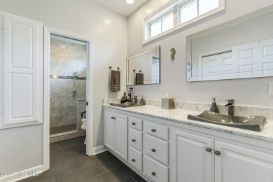 This well built, elegant home offers a unique blend of luxury on Sea Trail Golf Resort in North Carolina - for sale on GolfHomes.com, golf home, golf lot