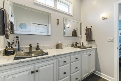 This well built, elegant home offers a unique blend of luxury on Sea Trail Golf Resort in North Carolina - for sale on GolfHomes.com, golf home, golf lot