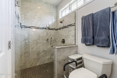 This well built, elegant home offers a unique blend of luxury on Sea Trail Golf Resort in North Carolina - for sale on GolfHomes.com, golf home, golf lot