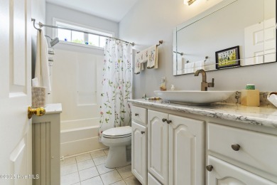 This well built, elegant home offers a unique blend of luxury on Sea Trail Golf Resort in North Carolina - for sale on GolfHomes.com, golf home, golf lot