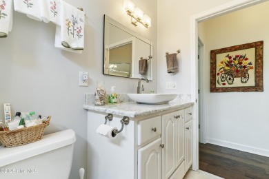 This well built, elegant home offers a unique blend of luxury on Sea Trail Golf Resort in North Carolina - for sale on GolfHomes.com, golf home, golf lot