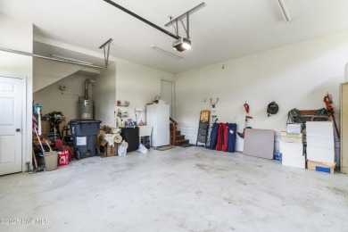 This well built, elegant home offers a unique blend of luxury on Sea Trail Golf Resort in North Carolina - for sale on GolfHomes.com, golf home, golf lot