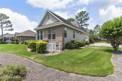 This well built, elegant home offers a unique blend of luxury on Sea Trail Golf Resort in North Carolina - for sale on GolfHomes.com, golf home, golf lot