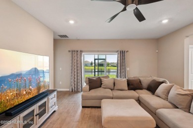 Discover modern sophistication in this popular Tivoli model on Eagle Landing Golf Club in Florida - for sale on GolfHomes.com, golf home, golf lot
