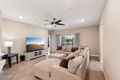 Discover modern sophistication in this popular Tivoli model on Eagle Landing Golf Club in Florida - for sale on GolfHomes.com, golf home, golf lot