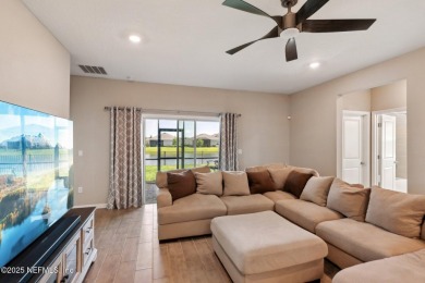 Discover modern sophistication in this popular Tivoli model on Eagle Landing Golf Club in Florida - for sale on GolfHomes.com, golf home, golf lot