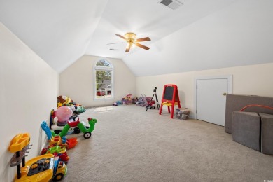 Welcome to this stunning Lowcountry-style home in the heart of on Wedgefield Plantation Golf Club in South Carolina - for sale on GolfHomes.com, golf home, golf lot