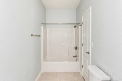 Tucked away in the sought-after Perdido Bay Country Club Estates on Perdido Bay Golf Club in Florida - for sale on GolfHomes.com, golf home, golf lot