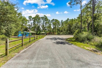 Tucked away in the sought-after Perdido Bay Country Club Estates on Perdido Bay Golf Club in Florida - for sale on GolfHomes.com, golf home, golf lot