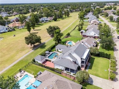 Presenting an exceptional residence in St. Charles Parish on Ormond Country Club in Louisiana - for sale on GolfHomes.com, golf home, golf lot