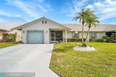 IMMACULATE 2 bed 2 bath VILLA features light-filled, OPEN floor on Cypress Lakes Golf Course - West Palm Beach in Florida - for sale on GolfHomes.com, golf home, golf lot