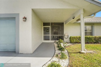 IMMACULATE 2 bed 2 bath VILLA features light-filled, OPEN floor on Cypress Lakes Golf Course - West Palm Beach in Florida - for sale on GolfHomes.com, golf home, golf lot