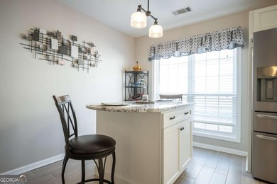 Enjoy low-maintenance living in a beautiful golf course setting on Jennings Mill Country Club in Georgia - for sale on GolfHomes.com, golf home, golf lot