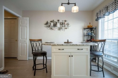 Enjoy low-maintenance living in a beautiful golf course setting on Jennings Mill Country Club in Georgia - for sale on GolfHomes.com, golf home, golf lot